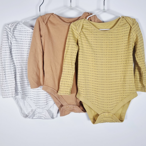 12-18M
3 Cotton Bodysuits